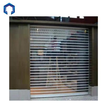 China Contemporary cheap electric anti hurricane transparent crystal rolling door for bank for sale