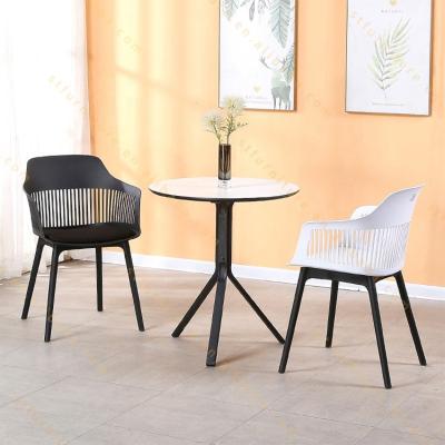 China New Fashion Dining Room Furniture Metal Foldable Leg Dining Chairs PVC Restaurant Dining Chair for sale