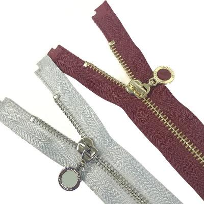 China Durable Plating Silver Gold Metal Zipper Polished Metal Zipper Dye Any Strip Color for sale