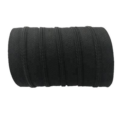 China Durable Nylon Garment Zipper Long Chain Nylon Zipper #4 Roll Up Black Zipper Tape for sale