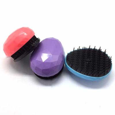 China Bubble Lovely Mini Egg Shape Portable Detangling Hair Brush for sale