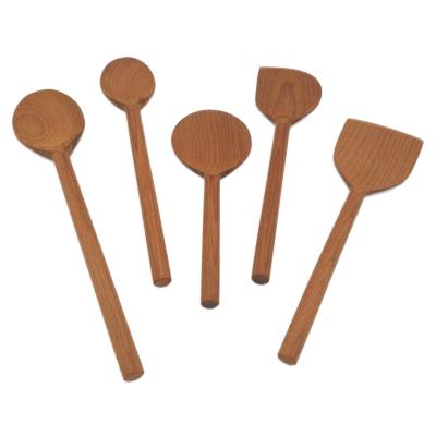 China Food Grade Heat Resistance Treatment Beech Dinner Cookware Set Sustainable Carbonized Spoon Turner Spatula for sale