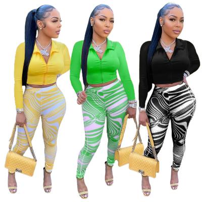 China 2022 Hot Selling QUICK DRY 2 Pieces Casual Pants Set Autumn Spring Women Clothes Solid Zipper Crop Top With Print Legging Suit for sale