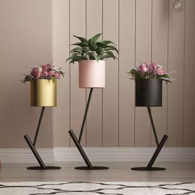 China Minimalist Indoor High Quality Round Iron Leg Decorated Flower Stand for sale