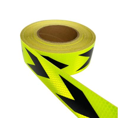 China Fluorescent Yellow Green Black Arrow Adhesive Prismatic Reflective Warning Tape for sale