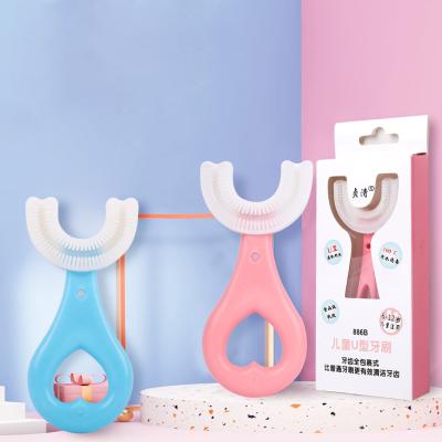 China Safe and soft U-shaped children's toothbrush latest portable silicone kids toothbrush for children aged 2 to 12 years old wholesale for sale