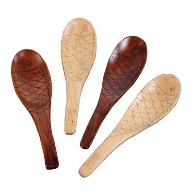 China Sustainable Japanese wooden tableware carving small wooden spoon creative fish shaped rice spoon for sale