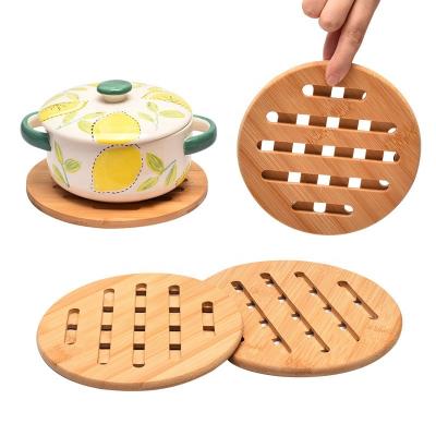 China Sustainable Amazon hollow round bamboo placemat creative bamboo table placemats home heat insulation mat set for sale