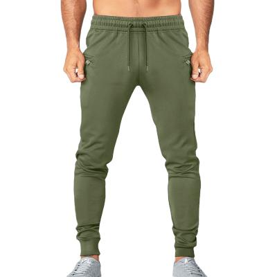 China 2021 Breathable Hot Selling Men's Custom Made Stretch Sport Zipper Side Pocket Slim Training Jogger Pants Gym Clothing for sale