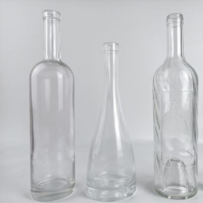 China Custom Clear Glass Wine Bottle Beverage Glass Bottle Maker Kitchen Glass Bottle for sale