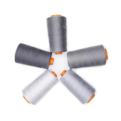 China Factory Promotion Price Good Quality 100% Spun Polyester High Tenacity 20/2 Durable Gray Jeans Sewing Thread For Garment for sale