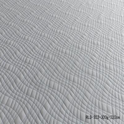 China Anti-Bacteria Wholesale Smooth Blue Wavy Patterned 100% Polyester Mattress Fabric for sale