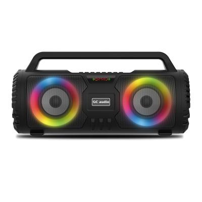 China New high quality private outdoor portable wireless BT speaker with color lights rechargeable battery changing fm radio USB TF MIC in it for sale