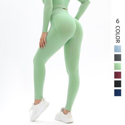 China Breathable Peach solid color jacquard yoga pants high waist high elastic tight sports running fitness pants for sale