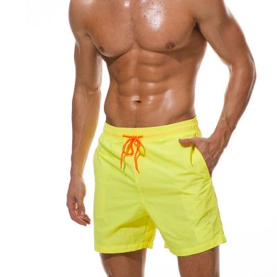 China 2021 New Men's Anti-wrinkle Drawstring Trunks Summer Beach Sports Casual Loose Men's Swimming Shorts for sale