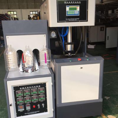 China Semi-automatic PET Bottle Stretch Blow Molding Machine Semi-automatic Blow Molding Machine For Drinking Bottles for sale