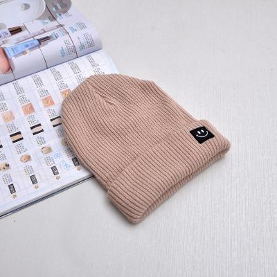 China Designer COMMON Your Own Logo Custom Men Women Cotton Wool Winter Knit Beanie Hat for sale