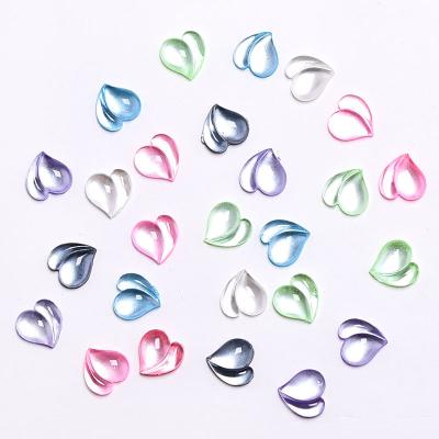 China Shiny Aurora Peach Heart Nail Art Accessories 3D Kawaii Resin Charms Cute Shiny Love Heart Nail Art Decoration for sale