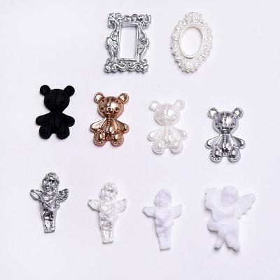 China Popular Baroque Embossed Decoration Angel Bear Nail Art Jewelry 3D Resin White Cupid Angel Nail Art Accessories for sale