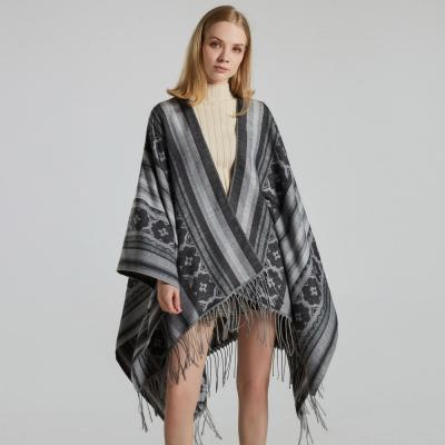 China All-match Design Elegant Women's Winter Wrap Blanket Knitted Fashion Thick Warm Poncho Cape Shawl Coat for sale