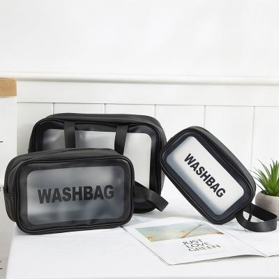 China Simple Translucent Fashion PVC Cosmetic Bag Scrub Wash Bag Portable Travel Bathroom Storage Bag for sale