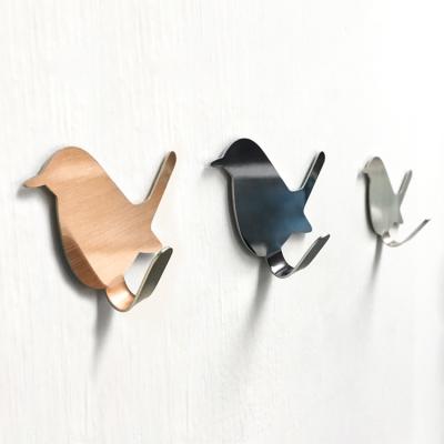 China Nailless Iron Hook Wall Hanging Pet Bird Pet Hanger Hook Creative Strong Adhesive Adhesive Scandinavian Cute Door Hanger for sale