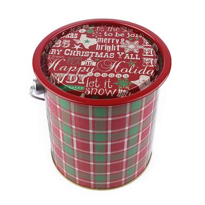 China Large Capacity Packaging Christmas Tin Gift Christmas Surprise Round Gift Tin Boxes With Inner Plug for sale