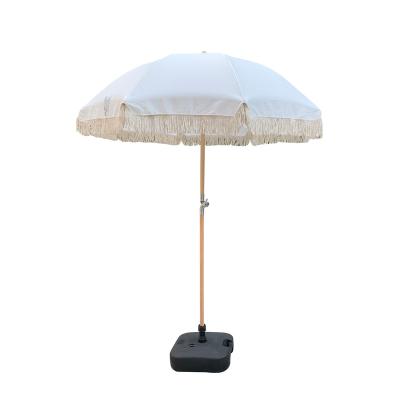 China Modern UV Protection Patio Outdoor Wood Beach Umbrella With Tassel Tassel Premium Umbrella for sale