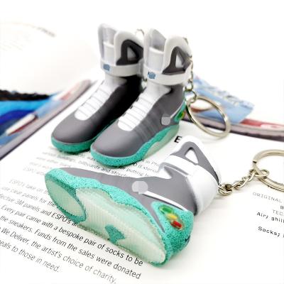 China Eco-Frendly Hot Selling Electric Air Magnetic Shoes Collection Model Back To The Future Movie Sneaker Key Chain With Bag Hanging Decoration for sale