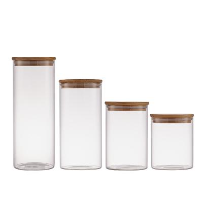 China Potes De Vidro Com Tampa De Bambu For Cookie Jars Wide Round Custom Food Storage New 200ml Clear Bamboo Glass Jars Sustainable Eco Friendly for sale