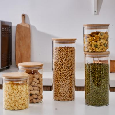 China Eco-Friendly Sustainable High Quality Airtight Clear Glass Cookie Candy Jar With Lids Bamboo Wooden Nuts Containers For Food Storage for sale