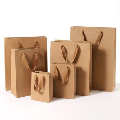 China Recycled Materials Paper To Carry Shopping Bag Maker Custom Vertical Brown Kraft Paper Christmas Gift To Carry Shopping Bag Gifts Carrier for sale