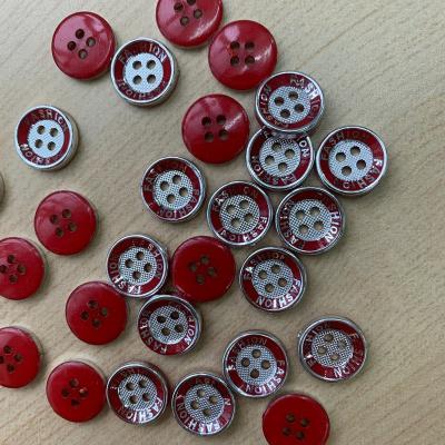 China Sustainable Africa Nigeria Market Four Eyes Resin Button for sale