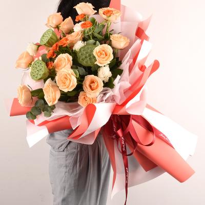 China Material Wholesale Two Color Bouquet Wrapping Paper Waterproof Double Sided Florist Rose Flower Wrapping Paper for sale