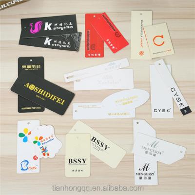 China Durable Elegant Design Gold Foil Hang Tags Clothing Swing Tags With Double Grommets for sale