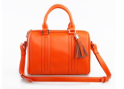 China Smooth Orange Ladies Leather Handbags Small Duffle Bag with Cotton Lining for sale