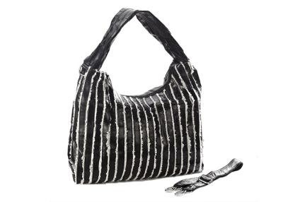 China Black White Striped Hobo Bag Leather Patchwork Bag with White Fringes for sale