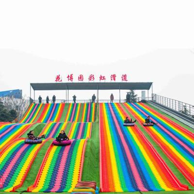 China 2022 Outdoor Popular Dry Theme Park Games Kids Plastic Slide Rainbow Slide For Sale for sale