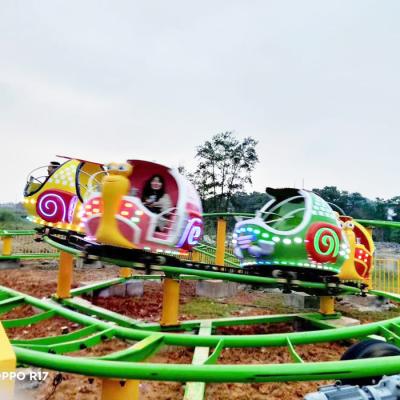 China Popular Family Fun Wooden Rides Sliding Mini Roller Coaster Snail Track Spinning Train For Sale for sale