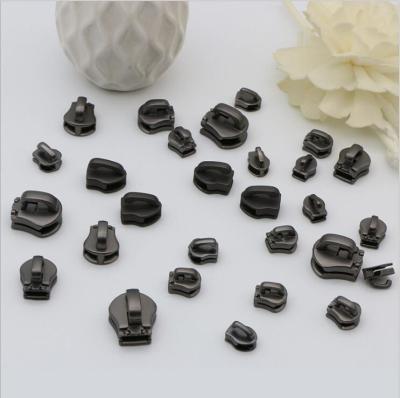 China High level all kinds of size metal handbag hardware zinc alloy zipper sliders with gunmetal color for sale