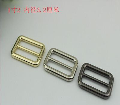 China Fashion custom light gold 32 mm metal tri-glide adjustable slide buckles for bags for sale