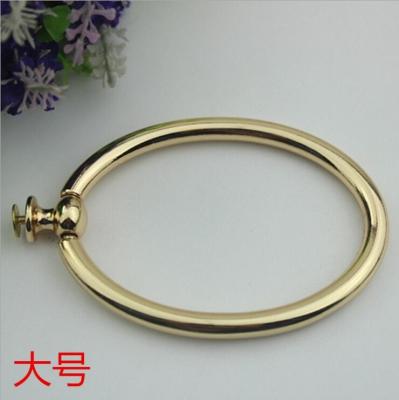 China Unique fashion handbag hardware light gold metal circle handle for tote bag for sale