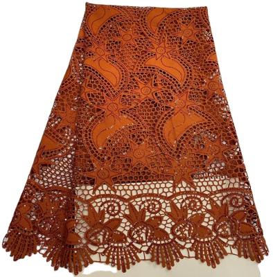 China Breathable Luxurious African Lace Fabric Nigerian Water Soluble Orange Brown With Sequin Beads Swiss Lace Pattern Circular Women Ski for sale