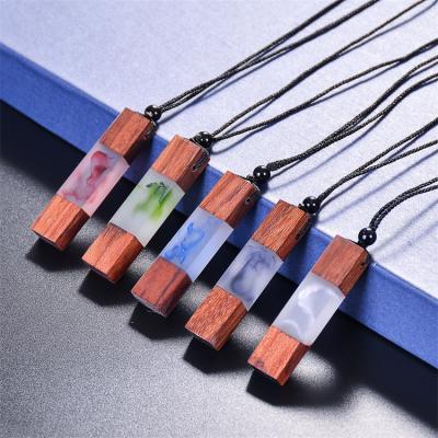 China 2020 New Design Resin Pendant Necklace Fashion Black Wooden Rainbow Stone Chain Stone Statement Flower Resin Wooden Pendant Necklace for sale