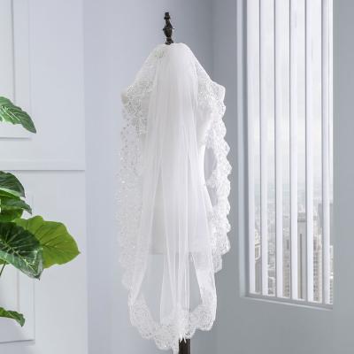 China Flower One Tier Fingertip Wedding Veils Lace Up Applique Bridal Veils Elegant Sequined Veils With Comb for sale