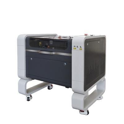 China Laser Engraving 4060 Laser Cutting and Engraving Machine Price Laser Cutting Machine 50w Laser Engraving Machine for sale