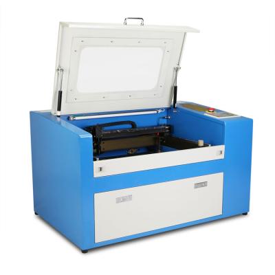 China 50W Laser Engraving Wood Engraving and Laser Engraving Machine 50w Laser Engraving Machine CO2 Laser Cutting Machine for sale