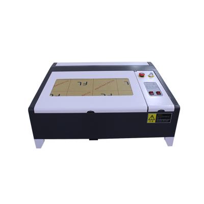 China Laser Engraving M2 Long Life 4040 High Quality CO2 Laser Engraving And Cutting Machine 40W/50W for sale