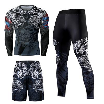 China Breathable Custom Sport Wear O Neck Jogging Mens Tracksuits Printing Casual Training Male Sweatsuit for sale