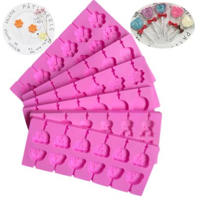 China Viable Wholesale Hard Candy Sugar Chocolate Mold Making Heat Resistance Cartoon Silicone Lollipop Molds For Kids for sale